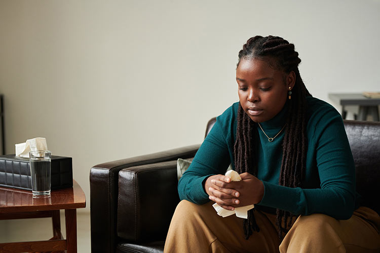 African American woman in trauma therapy session